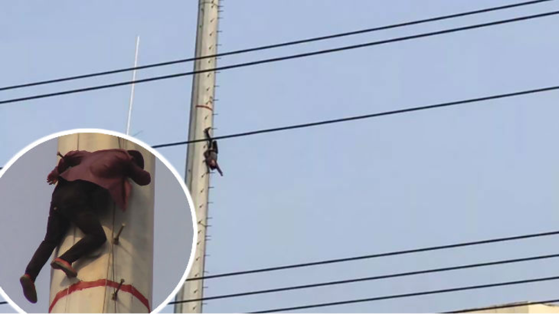 Bêbado é encontrado pendurado de cabeça para baixo num poste a 30 metros de altura