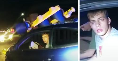 Homem com uma moca descomunal bate em carro da polícia, destrói semáforo e tenta agir com "normalidade"
